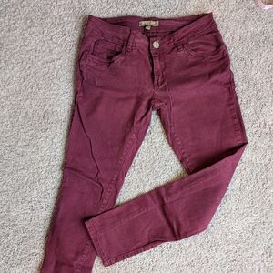 Cranberry colored skinny jeans by Romeo & Juliet couture